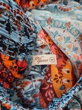 Vinco Floral Smocked Maxi Skirt in Blue, Orange & Red